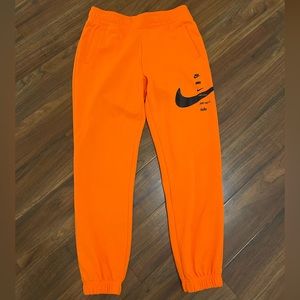 neon orange nike sweatpants